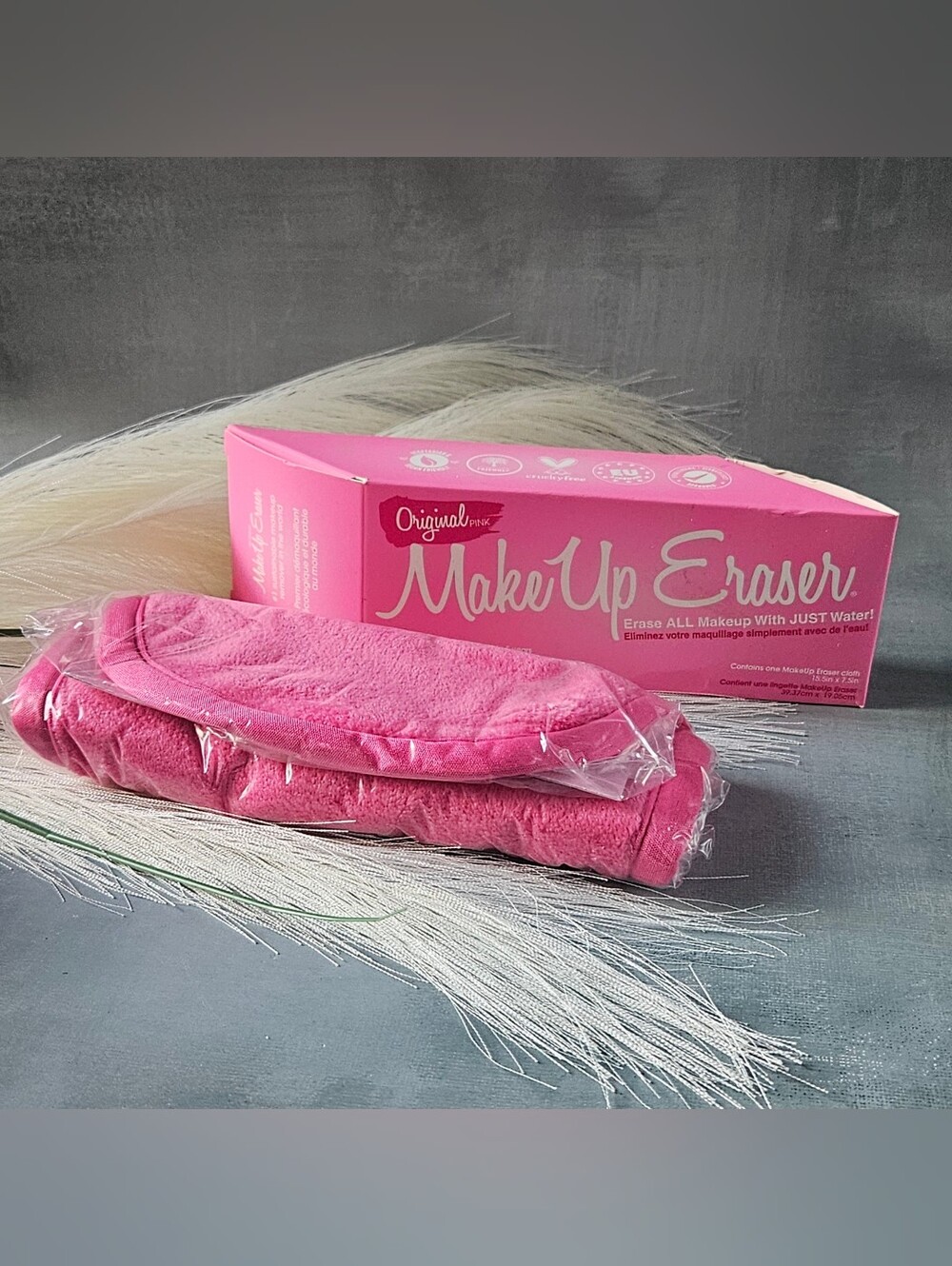 The Original MakeUp Eraser in its signature Original Pink color nib. a reusable,